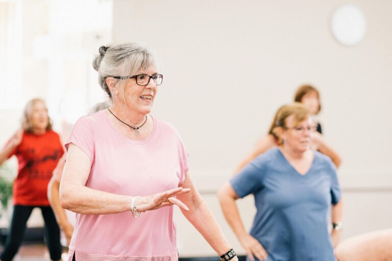 Senior women taking an exercise class to keep the brain sharp and active.
